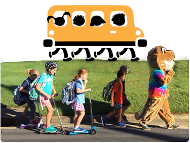 Walking School Bus graphic behind students walking and riding scooters.